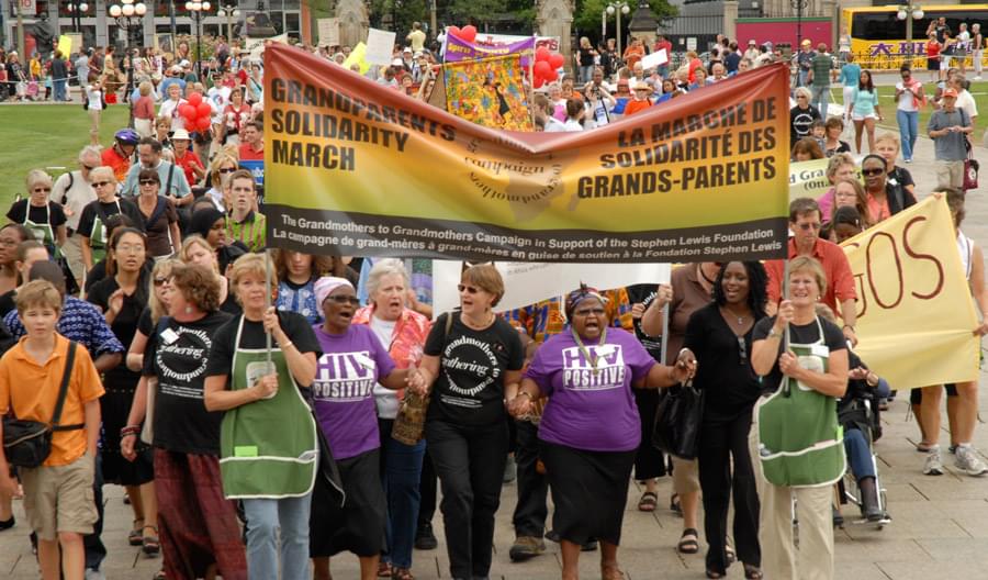grandmothers marching with banners